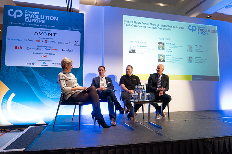 A photo of 4 people sitting onstage during a panel discussion at Channel Partners Europe 